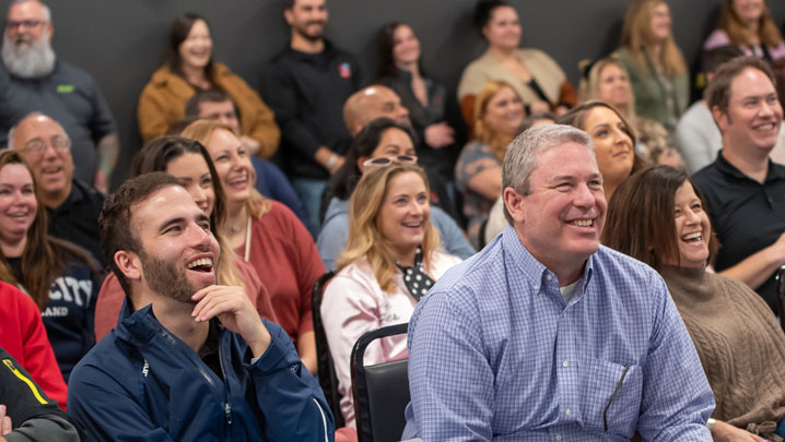 D&H co-owners enjoying a presentation
