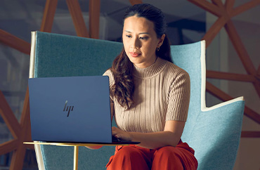 Woman using HP labtop